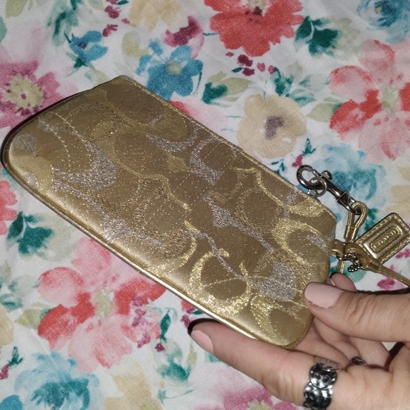 COACH Gold & Silver shimmering sparkles wristlet. - Picture 2 of 4